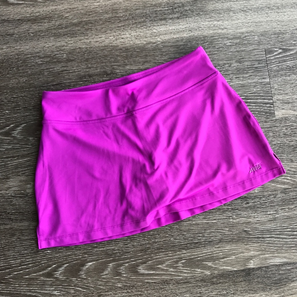 Avia athletic skirt with built in shorts.