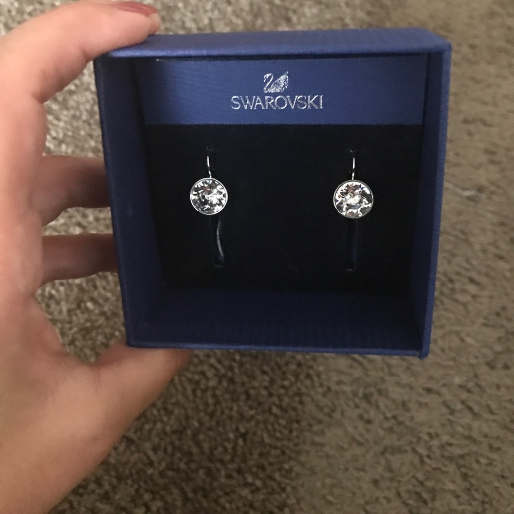 Swarovski earrings.