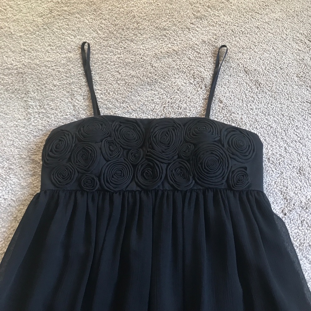 Black Rosebud embellished strapless dress.