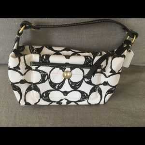 Black and white Coach purse.