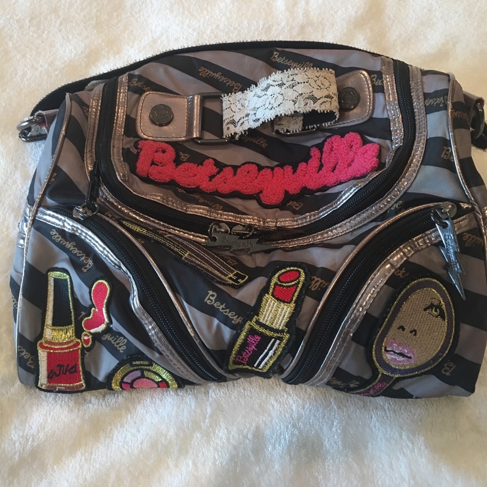 Makeup/travel bag by Betsey Johnson.