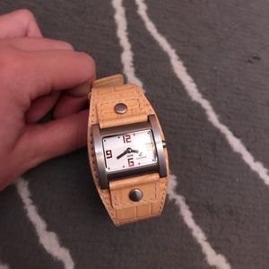 Light orange buckle watch