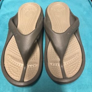 Like new Crocs flip flops - tan/brown - size 8