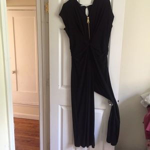 Black jumpsuit with gold zipper