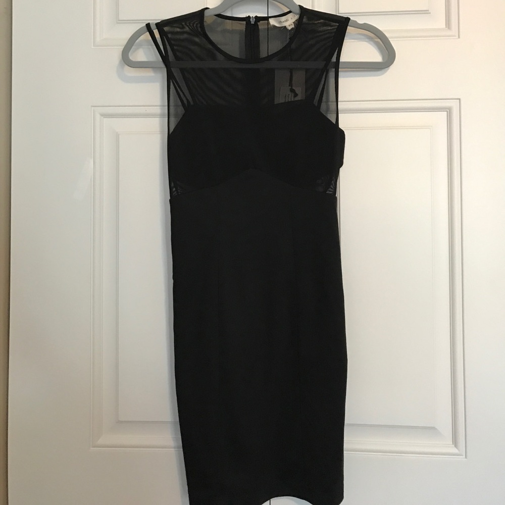 🆕 Sleek Cocktail Dress with Sheer Top