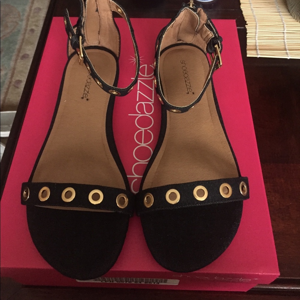 Black denim sandals with gold embellishments