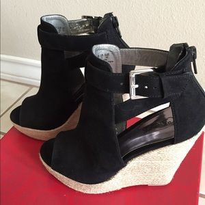 Carlos Santana Wedges