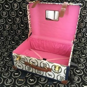 ISO vs pink suitcases luggage