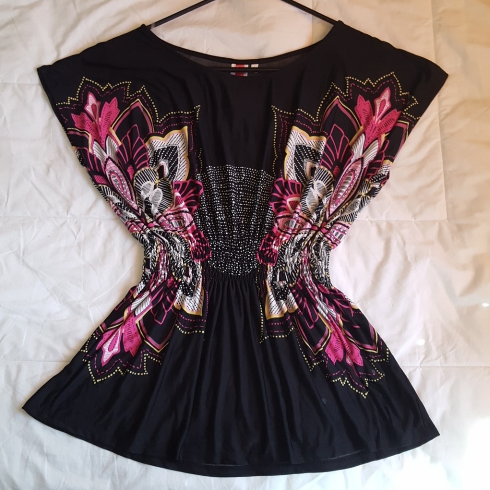 Black top with floral design