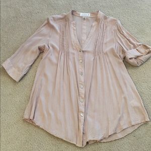 Feminine blush colored v-neck button down