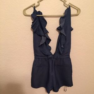 Cute jean romper .