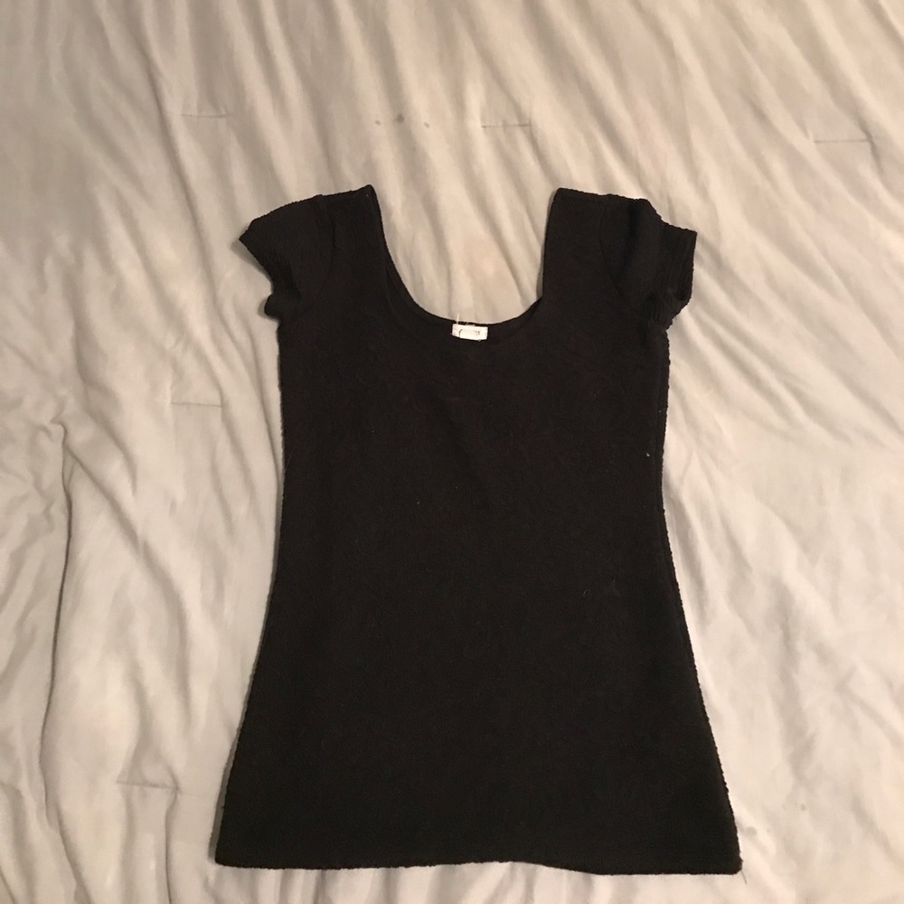 Black low cut in the back blouse bought at garage