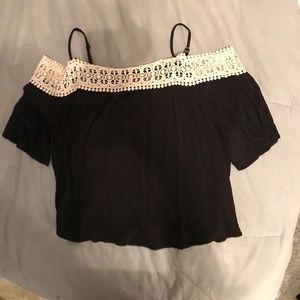 Black, off the shoulder, top lined with white lace