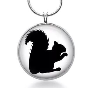 Black and white silhouette of a squirrel necklace