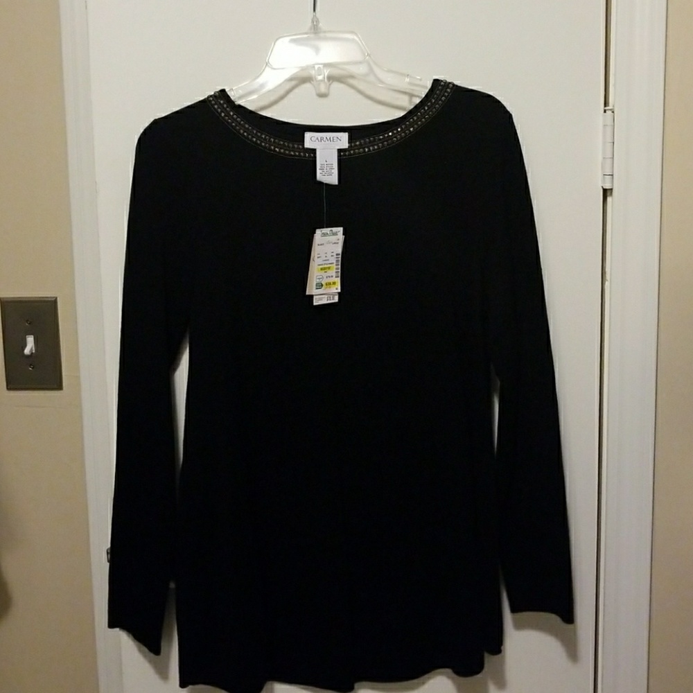 Elegant luxury yarn with black beaded neckline.