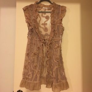 Ruffles and rose vest