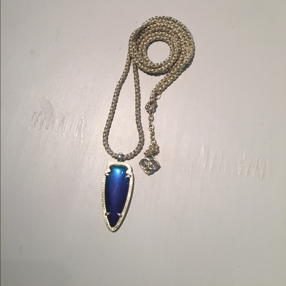Kendra Scott black arrowhead necklace.