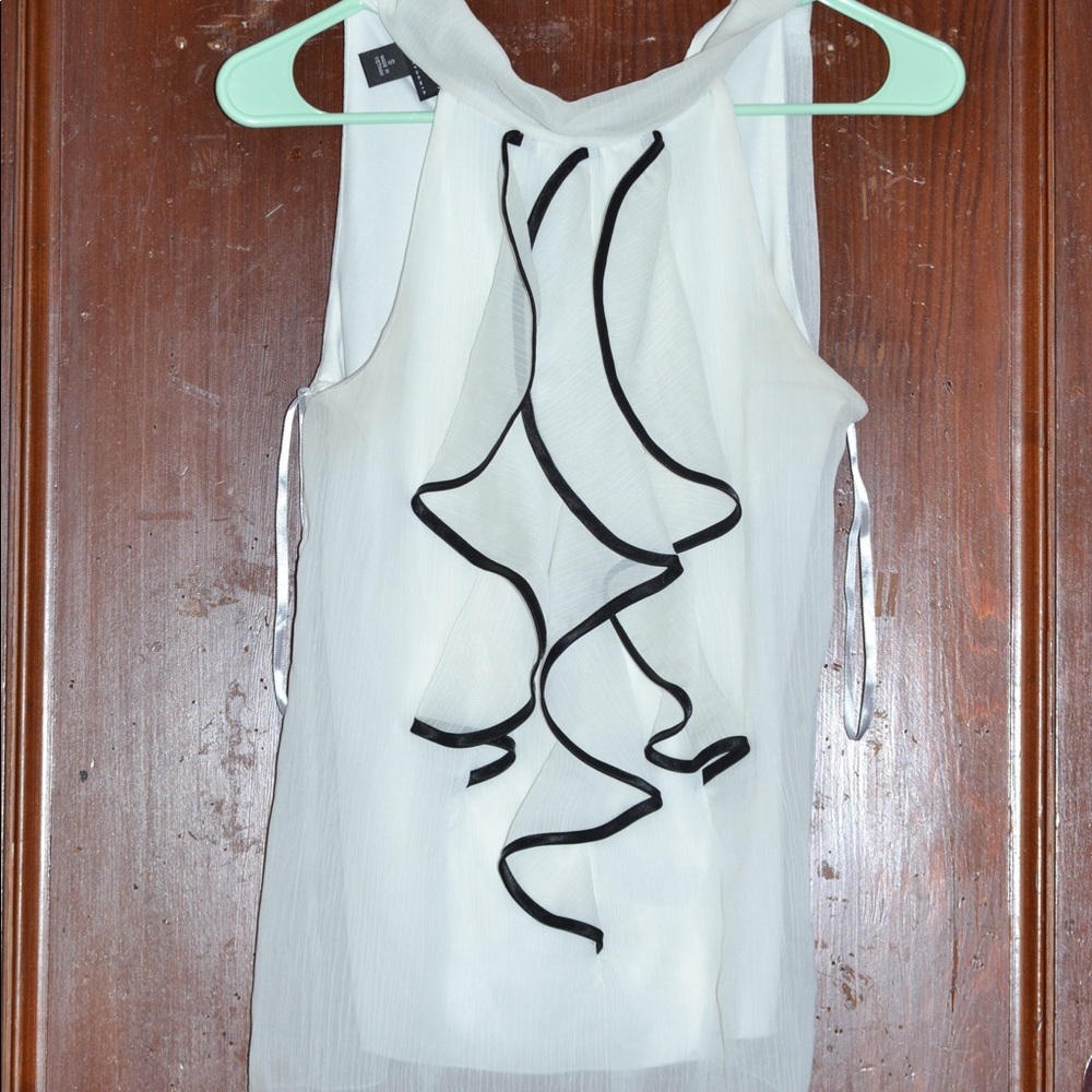 White Sleeveless Blouse