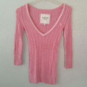 A&F pink V-neck sweater.