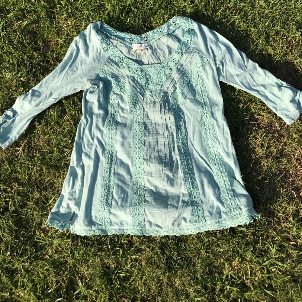 Beautiful blouse you can dress up or dress down.