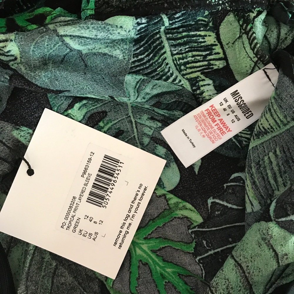 New with Tags! Black Tropical Romper. Never worn! - Picture 4 of 5