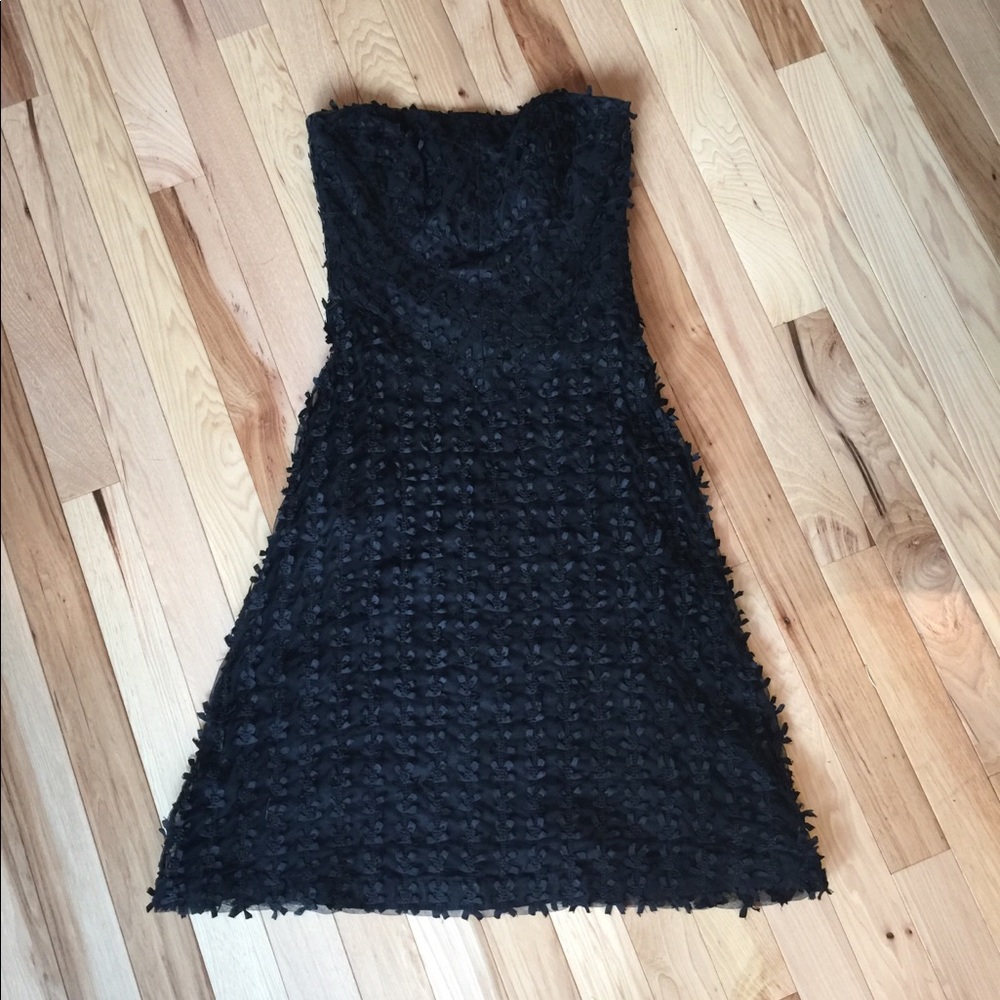 WHBM strapless black dress w/ bow overlay. Size 2