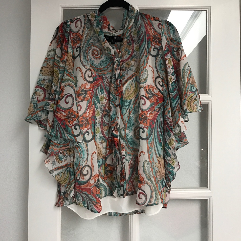 Pattern top with cream tank underneath