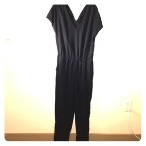 Navy romper/ runs big