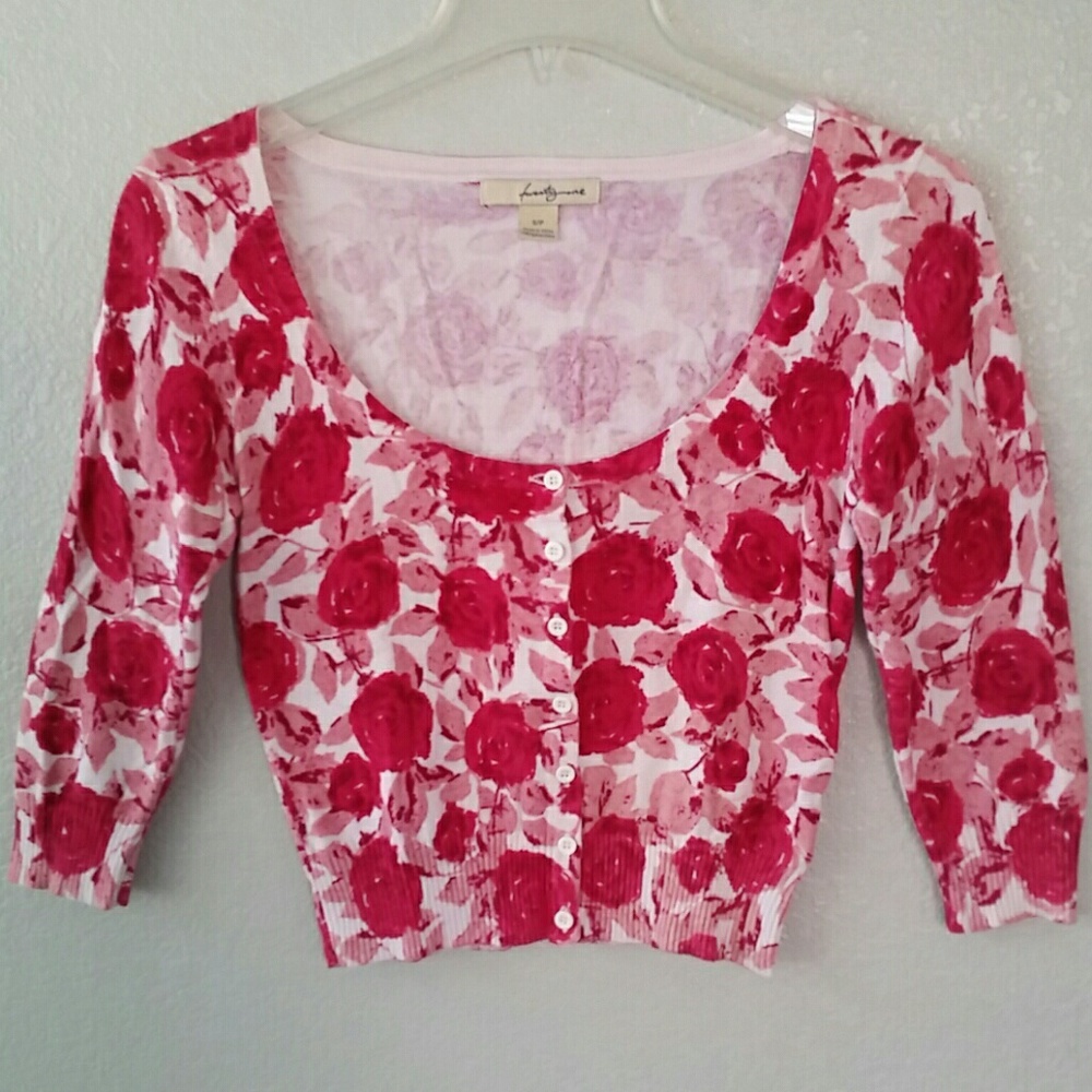 Pink floral button-up cardigan.
