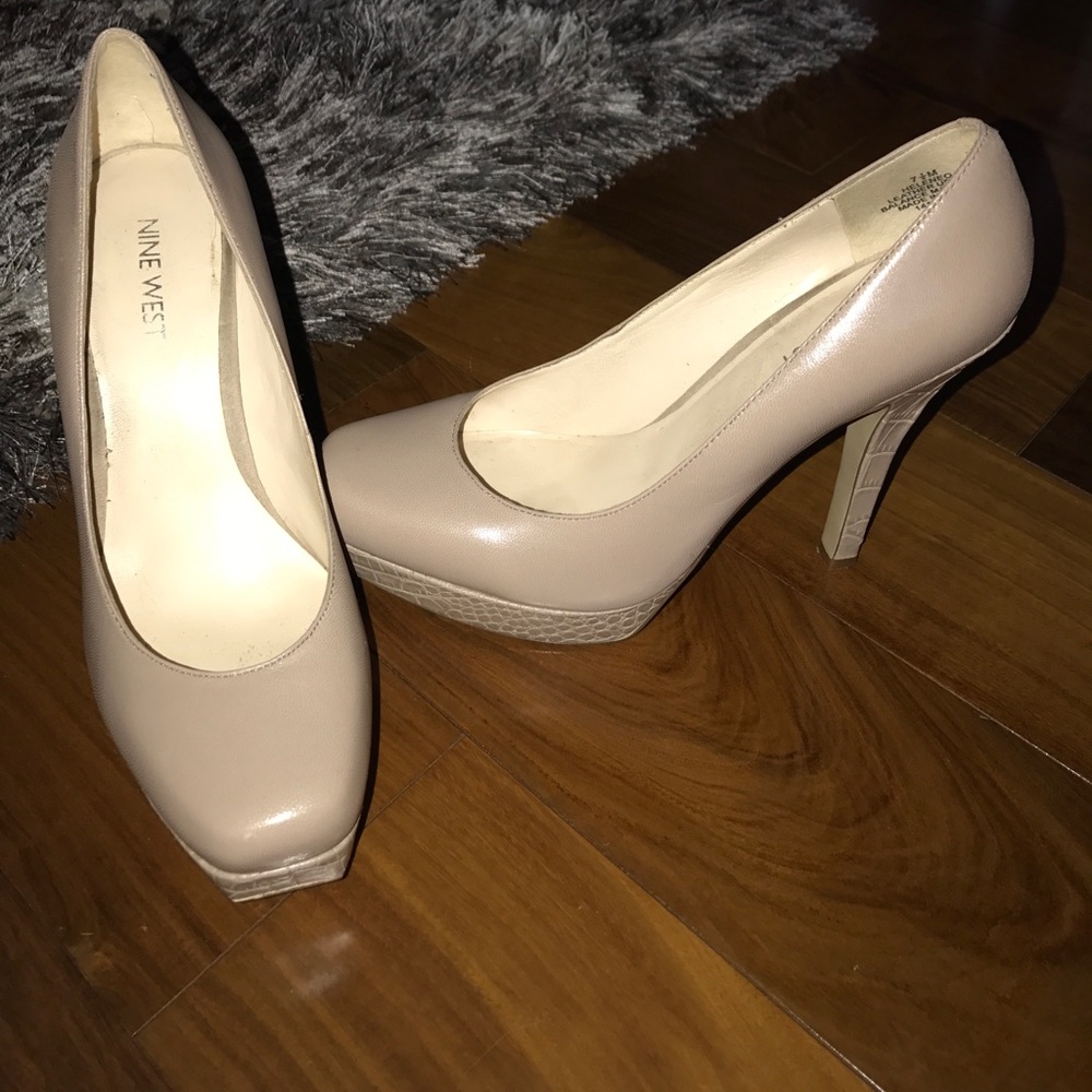 Nine West nude heels with snake skin design.