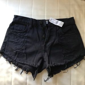 Black ripped jean shorts