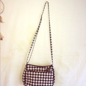 Brand name over the shoulder purse.