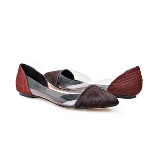 Red hair on leather flats