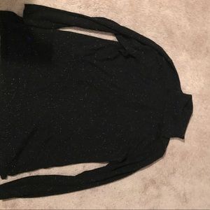 Cozy, Calvin Klein white speckled turtleneck.