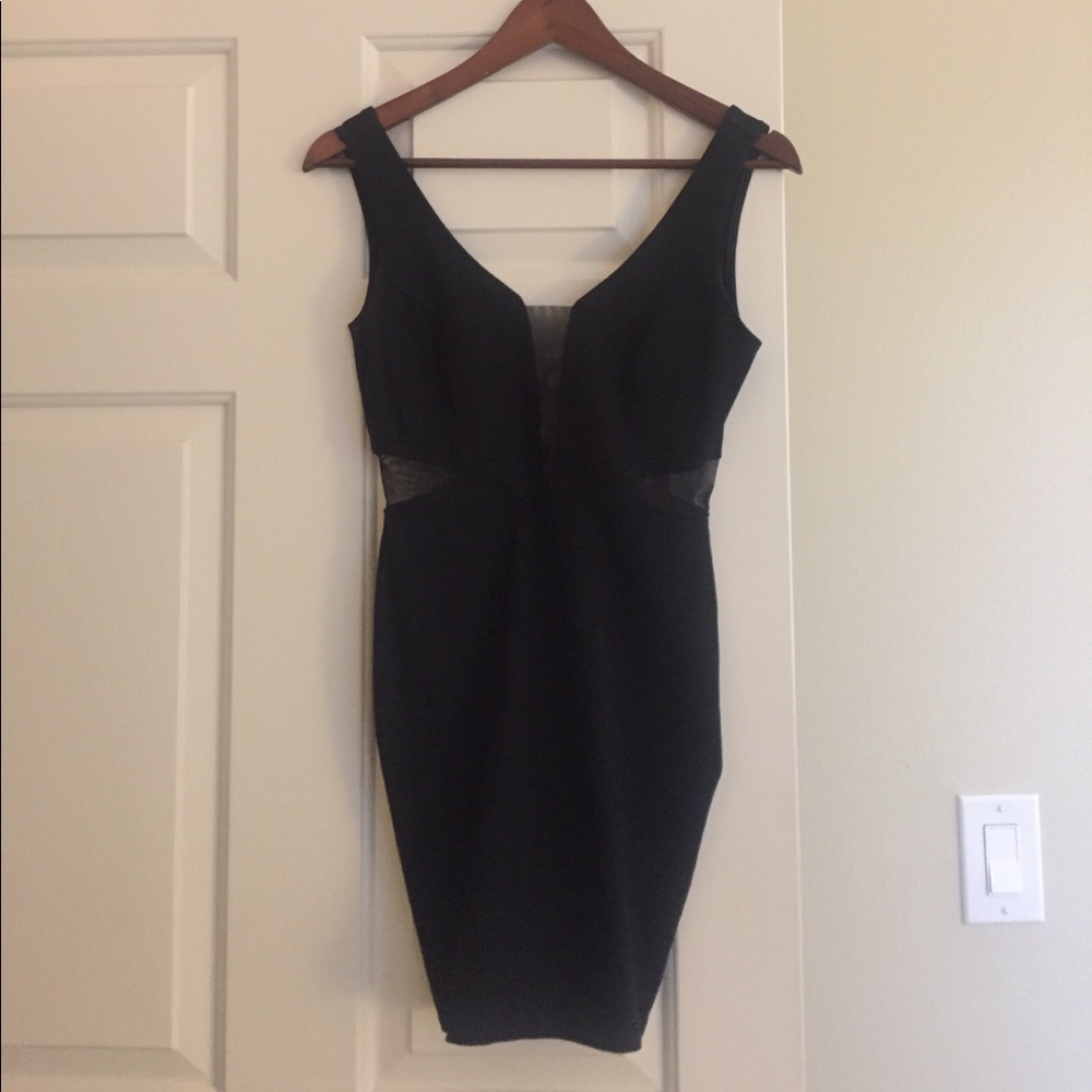 Little black dress with sexy sheer cut outs :)
