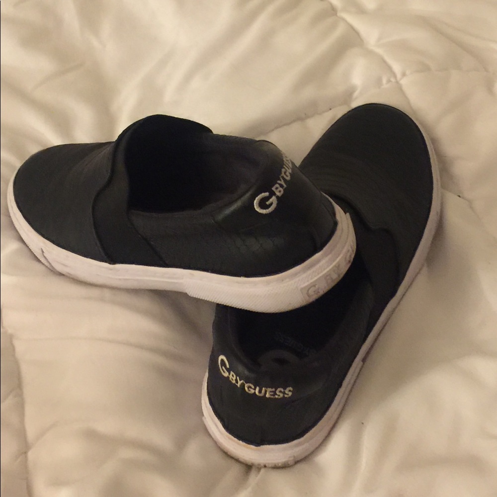 Guess black slip ons