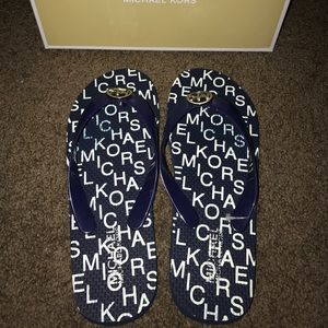 Michael Kors flip flips