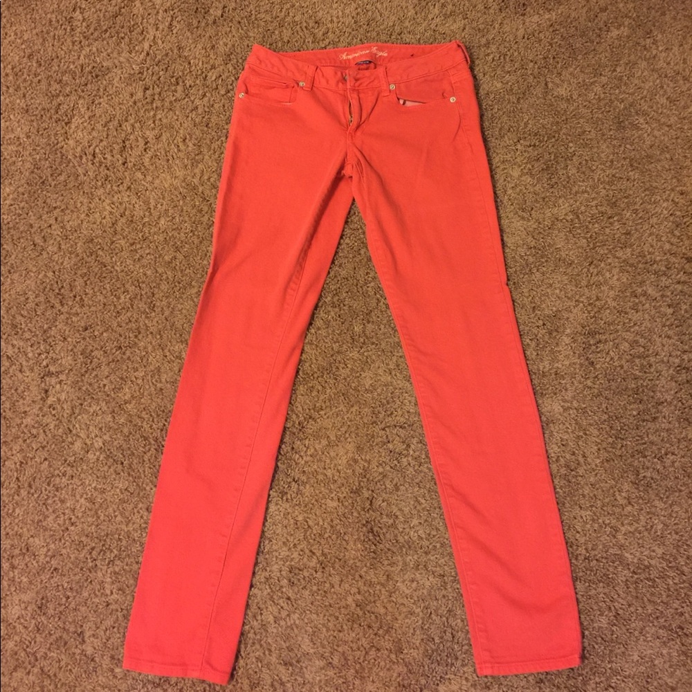 American Eagle red/orange skinny jeans