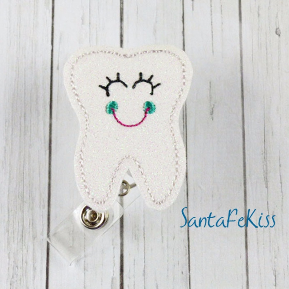 Smiling Tooth Vinyl Badge Reel