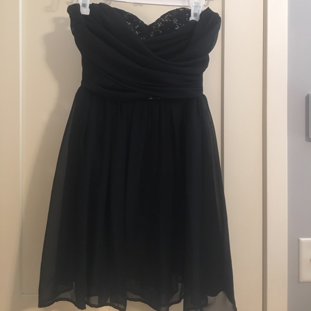 Black, strapless small dress with lace