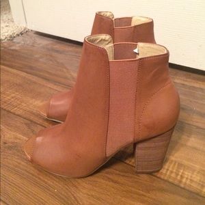 Peep toe heeled booties Peep toe heeled booties