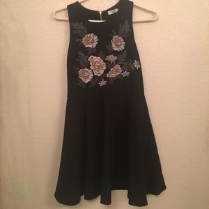 Black skater dress with floral embroidery