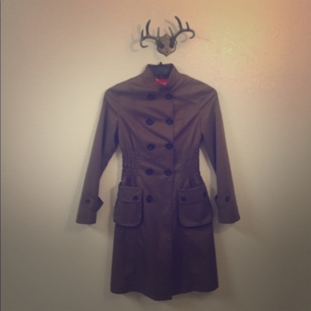 Olive rain coat in like new condition