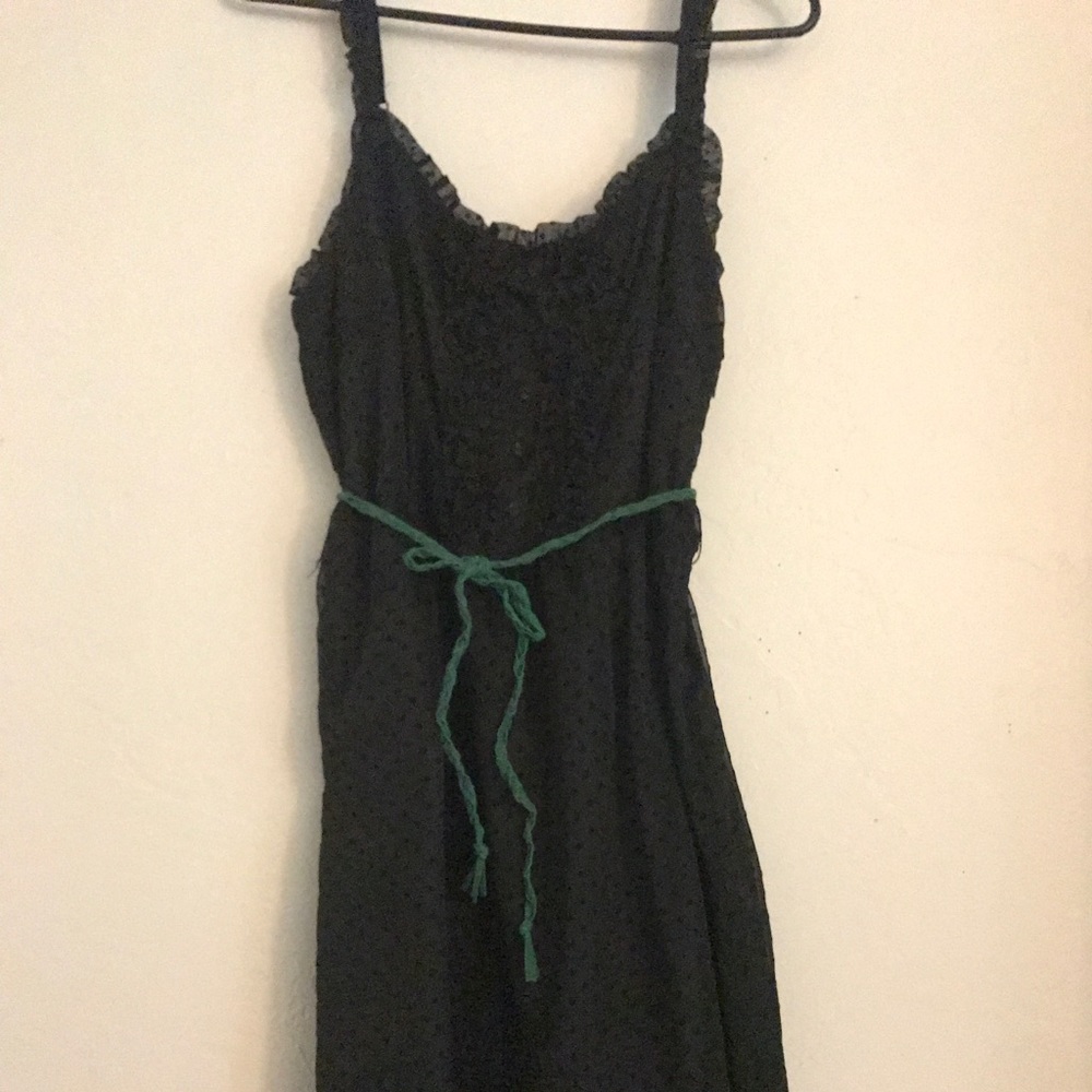 Black Dress with a green belt.
