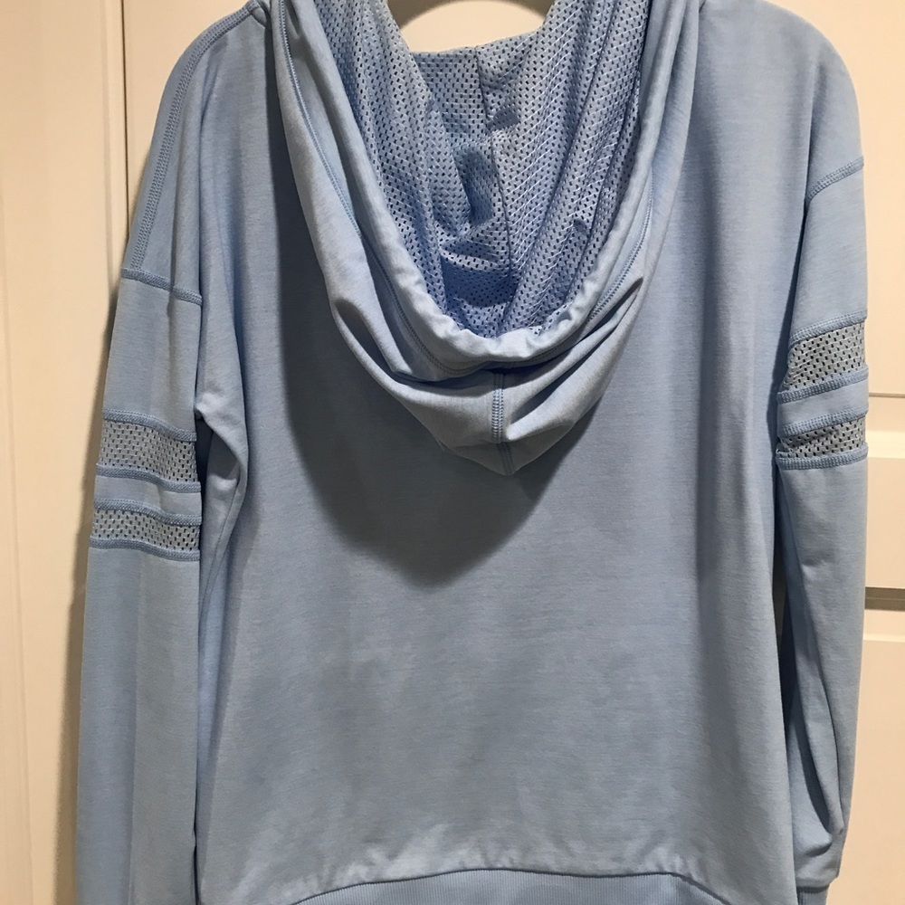 Lorna Jane baby blue pullover sweatshirt.