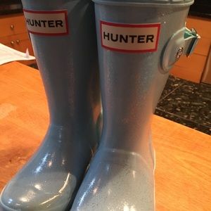 Girls Hunter rain boots.
