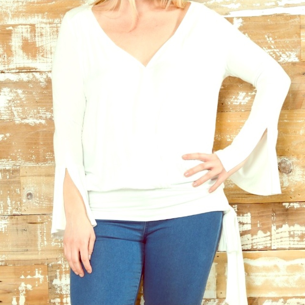 White wrap-front, split -sleeve top with side tie
