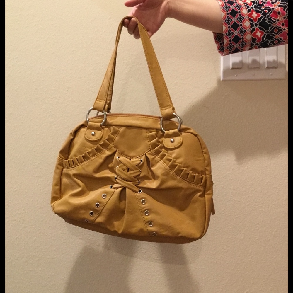 Yellow purse with lace up detail