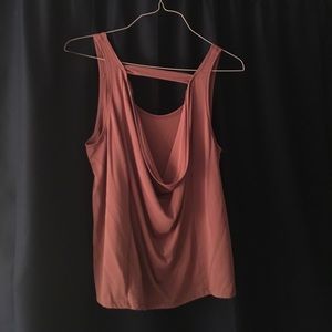 Blush colored sleeveless blouse with open back