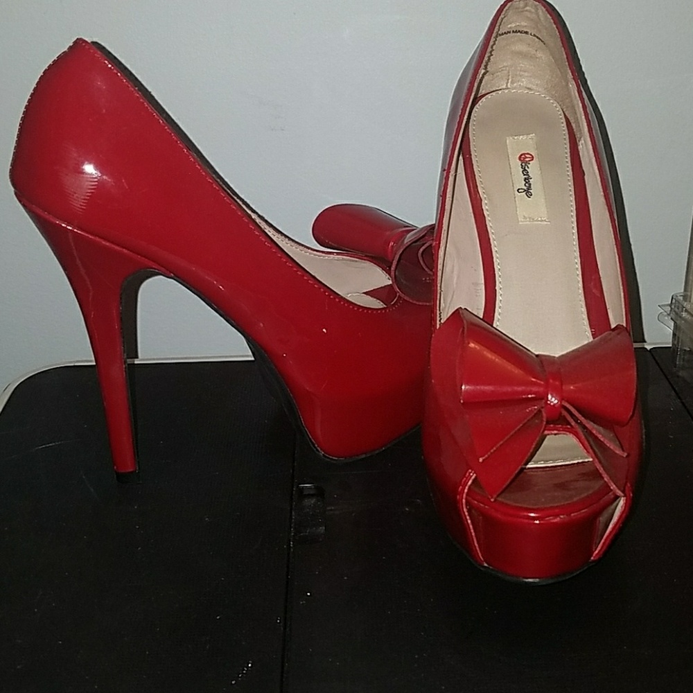 Red shiny heels